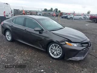 ✅ 2018 Toyota Camry LE • VIN: 4T1B11HK3JU021481 • Lot: 43082624. Listed on IAAI with 46,951 mi. Free auction sales archive from the USA and detailed vehicle history report at DreamBid. Image 1.
