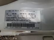 ✅ 2001 Mazda Protege DX • VIN: JM1BJ222410441812 • Лот: 88330565. Опубликован ранее на Copart с пробегом 169 447 миль. Бесплатный доступ к архиву аукционных продаж из США и подробный отчёт об истории автомобиля на DreamBid. Изображение 14.