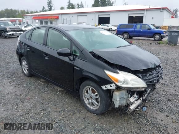 ✅ 2015 Toyota Prius Persona Series • VIN: JTDKN3DUXF0460557 • Lot: 42379342. Listed on IAAI with 106,162 mi. Free auction sales archive from the USA and detailed vehicle history report at DreamBid. Image 1.