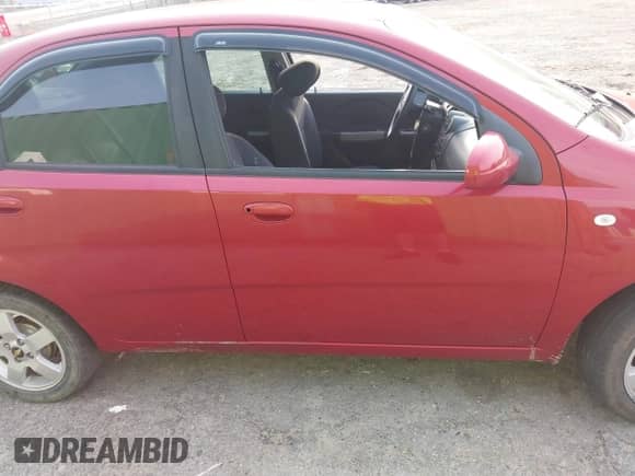 2006 Chevrolet Aveo LT with VIN KL1TG56666B555878, listed as a IAAI auction lot 41779006 with 57,179 mi miles and . Bid and sale history available at DreamBid. Image 13.