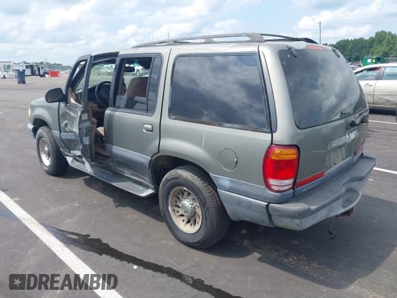 ✅ 2000 Mercury Mountaineer • VIN: 4M2ZU76E1YUJ15339 • Lot: 43004599. Listed on IAAI with 202,505 mi. Free auction sales archive from the USA and detailed vehicle history report at DreamBid. Image 3.