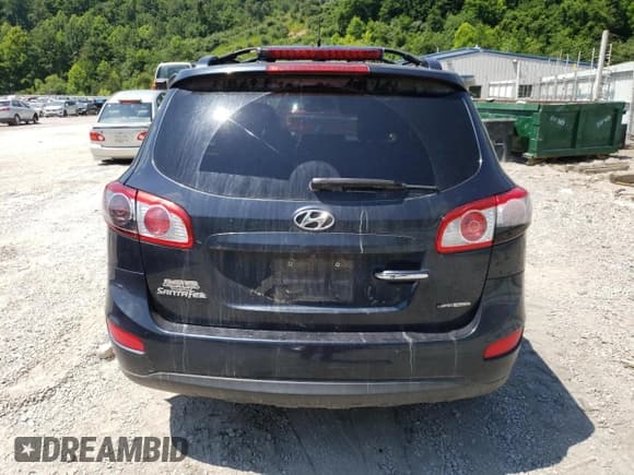 ✅ 2012 Hyundai Santa Fe Limited • VIN: 5XYZKDAG3CG129451 • Lot: 60146344. Listed on Copart with 133,165 mi. Free auction sales archive from the USA and detailed vehicle history report at DreamBid. Image 6.