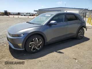 2022 Hyundai Ioniq 5 SEL z VIN KM8KNDAF4NU104457, wystawiony jako Copart lot #52183404 z przebiegiem 16 036 mil mil oraz . Historia ofert i sprzedaży dostępna na DreamBid. Obrazek 1.