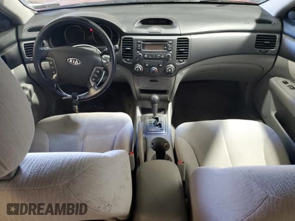 ✅ 2006 Kia Optima LX • VIN: KNAGE123065079806 • Lot: 69181725. Wystawiony na Copart z przebiegiem 80 109 mil. Bezpłatny archiwum sprzedaży aukcyjnych z USA i szczegółowy raport historii pojazdu na DreamBid. Zdjęcie 8.