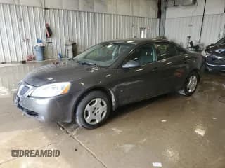 ✅ 2006 Pontiac G6 1SV • VIN: 1G2ZF55B964264238 • Лот: 65635295. Опубликован ранее на Copart с пробегом 214 986 миль. Бесплатный доступ к архиву аукционных продаж из США и подробный отчёт об истории автомобиля на DreamBid. Изображение 1.