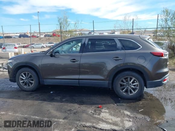 ✅ 2016 Mazda CX-9 Touring • VIN: JM3TCBCY3G0112522 • Лот: 43806962. Опубликован ранее на IAAI с пробегом 102 518 миль. Бесплатный доступ к архиву аукционных продаж из США и подробный отчёт об истории автомобиля на DreamBid. Изображение 14.