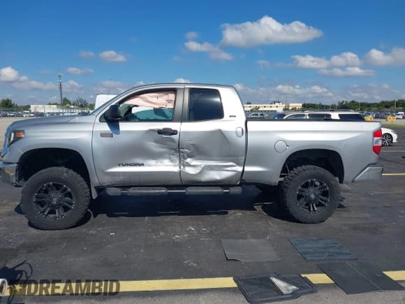 ✅ 2014 Toyota Tundra SR5 • VIN: 5TFRM5F18EX073513 • Lot: 43738760. Listed on IAAI with 92,586 mi. Free auction sales archive from the USA and detailed vehicle history report at DreamBid. Image 14.