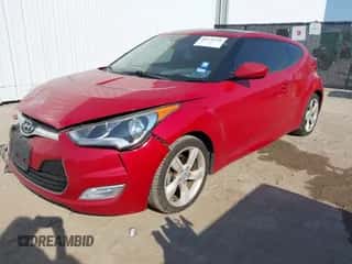 2014 Hyundai Veloster z VIN KMHTC6AD3EU199372, wystawiony jako IAAI lot #43236218 z przebiegiem 145 635 mil mil oraz . Historia ofert i sprzedaży dostępna na DreamBid. Obrazek 2.