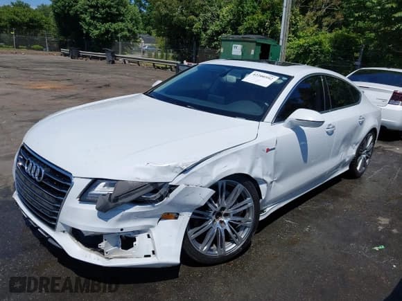 ✅ 2014 Audi A7 Prestige • VIN: WAU2GAFC9EN060846 • Лот: 42200592. Опубликован ранее на IAAI с пробегом 166 250 миль. Бесплатный доступ к архиву аукционных продаж из США и подробный отчёт об истории автомобиля на DreamBid. Изображение 2.