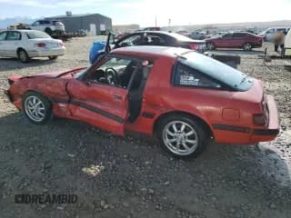 ✅ 1985 Mazda RX-7 • VIN: JM1FB3316F0888675 • Lot: 85257814. Wystawiony na Copart z przebiegiem 141 724 mil. Bezpłatny archiwum sprzedaży aukcyjnych z USA i szczegółowy raport historii pojazdu na DreamBid. Zdjęcie 2.