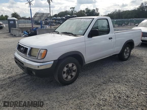 ✅ 1998 Nissan Frontier XE • VIN: 1N6DD21SXWC387985 • Lot: 84769815. Listed on Copart with 184,959 mi. Free auction sales archive from the USA and detailed vehicle history report at DreamBid. Image 1.