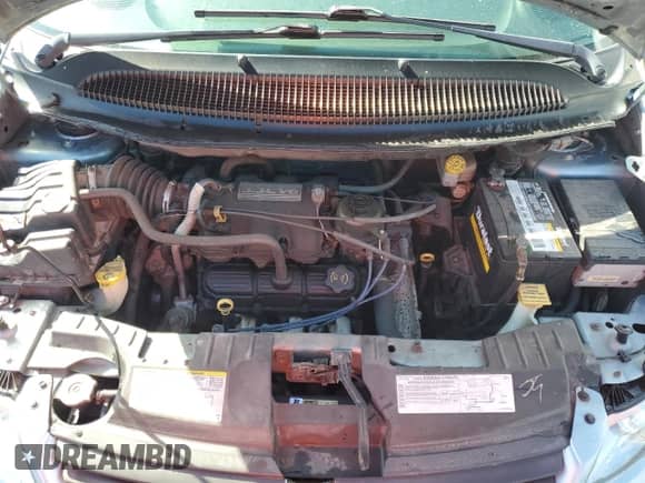 2005 Dodge Caravan SXT с VIN 1D4GP45R85B380101, выставлен на аукционе Copart как лот 77202344 с пробегом 185 107 миль миль и Списание • Salvage title. История ставок и продаж доступна на DreamBid. Изображение 12.