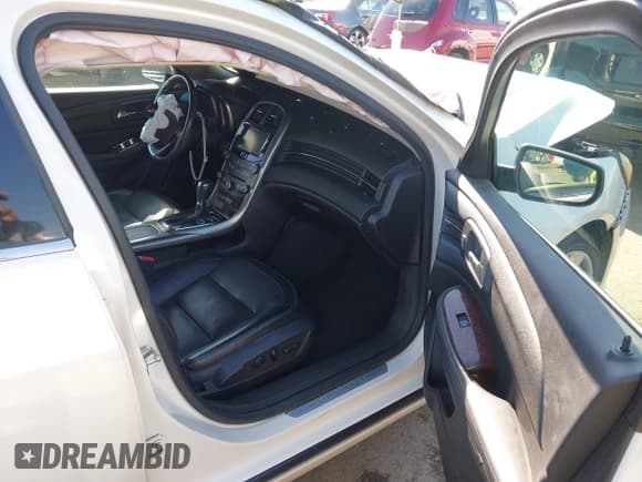 ✅ 2013 Chevrolet Malibu LTZ • VIN: 1G11J5SX5DF183934 • Lot: 43282719. Listed on IAAI with 92,538 mi. Free auction sales archive from the USA and detailed vehicle history report at DreamBid. Image 5.