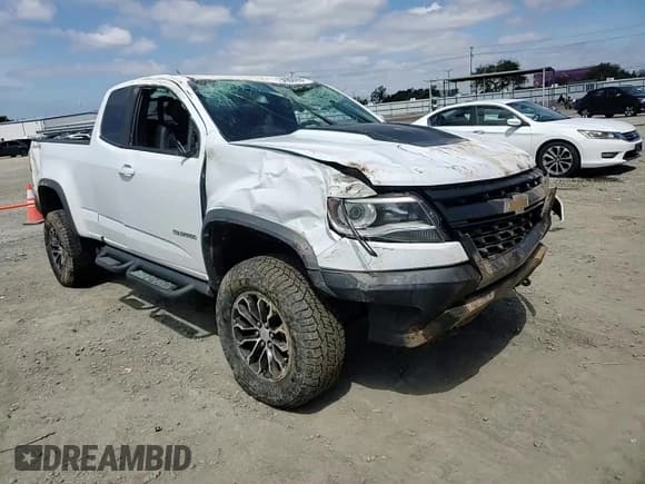 ✅ 2018 Chevrolet Colorado 4WD ZR2 • VIN: 1GCRTEEN5J1272992 • Лот: 50938455. Опубликован ранее на Copart с пробегом 62 191 миль. Бесплатный доступ к архиву аукционных продаж из США и подробный отчёт об истории автомобиля на DreamBid. Изображение 10.
