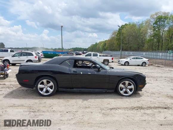 ✅ 2013 Dodge Challenger SXT • VIN: 2C3CDYAG0DH629128 • Lot: 41974990. Wystawiony na IAAI z przebiegiem Nie podano. Bezpłatny archiwum sprzedaży aukcyjnych z USA i szczegółowy raport historii pojazdu na DreamBid. Zdjęcie 13.