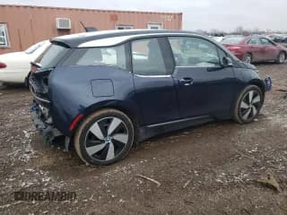 ✅ 2018 BMW i3 • VIN: WBY7Z4C52JVC34701 • Лот: 37128813. Опубликован ранее на Copart с пробегом 37 523 миль. Бесплатный доступ к архиву аукционных продаж из США и подробный отчёт об истории автомобиля на DreamBid. Изображение 3.