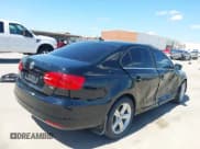 ✅ 2012 Volkswagen Jetta TDI w/Premium & Nav • VIN: 3VWLL7AJ0CM410008 • Lot: 43011566. Listed on IAAI with 207,018 mi. Free auction sales archive from the USA and detailed vehicle history report at DreamBid. Image 4.