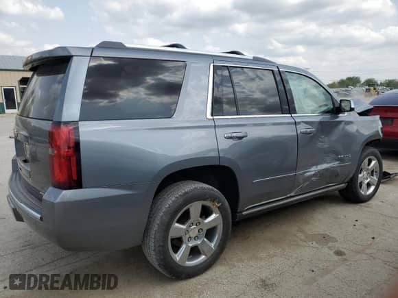 2020 Chevrolet Tahoe Premier with VIN 1GNSKCKC7LR125399, listed as a Copart auction lot 54702635 with 134,684 mi miles and Salvage title. Bid and sale history available at DreamBid. Image 3.