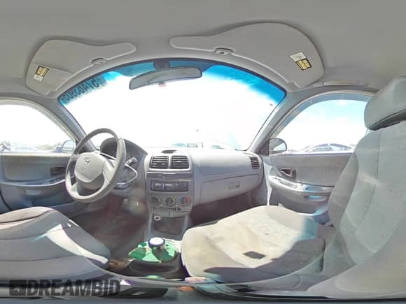 2004 Hyundai Accent GL z VIN KMHCG45C94U574027, wystawiony jako Copart lot #57463905 z przebiegiem 139 595 mil mil oraz Szkoda całkowita • Salvage title. Historia ofert i sprzedaży dostępna na DreamBid. Obrazek 15.