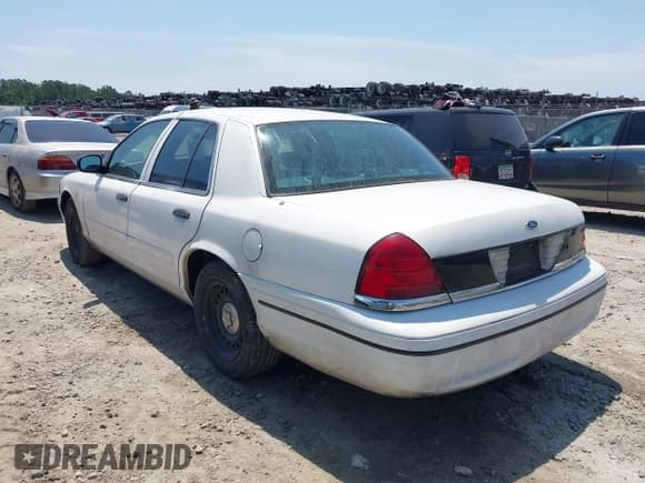 ✅ 2000 Ford Crown Victoria Police Interceptor • VIN: 2FAFP71W9YX208897 • Лот: 42597305. Опубликован ранее на IAAI с пробегом 128 699 миль. Бесплатный доступ к архиву аукционных продаж из США и подробный отчёт об истории автомобиля на DreamBid. Изображение 3.