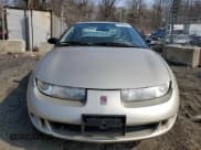 ✅ 1998 Saturn SC • VIN: 1G8ZE1289WZ126065 • Лот: 47439275. Опубликован ранее на Copart с пробегом 96 621 миль. Бесплатный доступ к архиву аукционных продаж из США и подробный отчёт об истории автомобиля на DreamBid. Изображение 5.