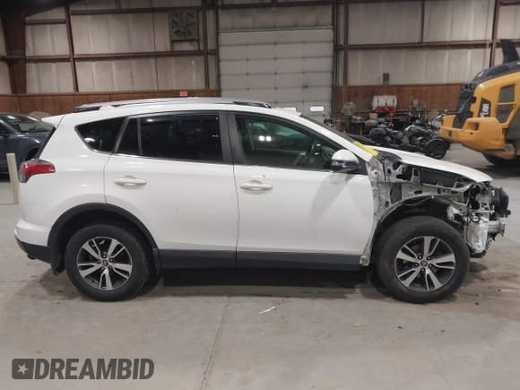 ✅ 2018 Toyota RAV4 XLE • VIN: JTMRFREV3JJ219691 • Лот: 43612972. Опубликован ранее на IAAI с пробегом 94 682 миль. Бесплатный доступ к архиву аукционных продаж из США и подробный отчёт об истории автомобиля на DreamBid. Изображение 14.