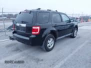 ✅ 2009 Ford Escape Limited • VIN: 1FMCU04G99KA79903 • Lot: 43912769. Listed on IAAI with 169,916 mi. Free auction sales archive from the USA and detailed vehicle history report at DreamBid. Image 4.