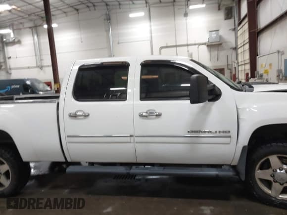 ✅ 2013 GMC Sierra 2500HD Denali • VIN: 1GT125E87DF166982 • Lot: 41414906. Listed on IAAI with 293,947 mi. Free auction sales archive from the USA and detailed vehicle history report at DreamBid. Image 13.