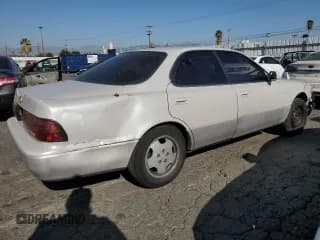 ✅ 1994 Lexus ES 300 • VIN: JT8GK13T1R0051202 • Lot: 83668264. Listed on Copart with 165,148 mi. Free auction sales archive from the USA and detailed vehicle history report at DreamBid. Image 3.