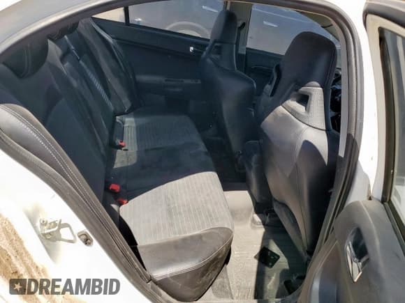 ✅ 2013 Mitsubishi Lancer Evolution MR • VIN: JA32W5FV9DU023927 • Лот: 84158745. Опубликован ранее на Copart с пробегом 72 834 миль. Бесплатный доступ к архиву аукционных продаж из США и подробный отчёт об истории автомобиля на DreamBid. Изображение 10.