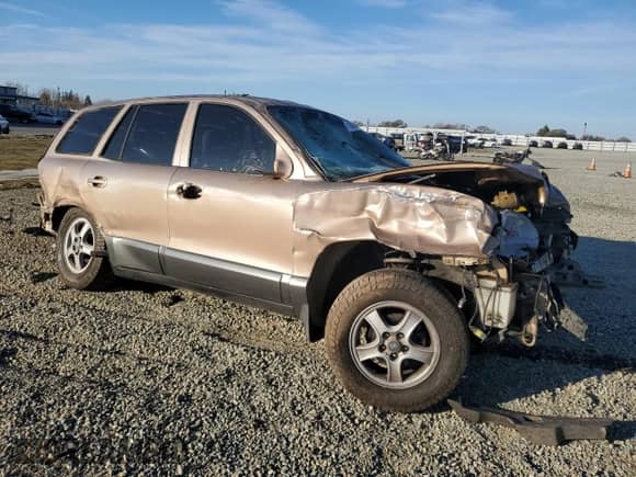 2002 Hyundai Santa Fe GLS z VIN KM8SC13D52U181981, wystawiony jako Copart lot #41909695 z przebiegiem Nie podano mil oraz Szkoda całkowita • Salvage title. Historia ofert i sprzedaży dostępna na DreamBid. Obrazek 4.