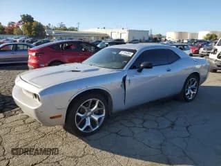 ✅ 2009 Dodge Challenger SE • VIN: 2B3LJ44VX9H522894 • Lot: 81184364. Wystawiony na Copart z przebiegiem 129 069 mil. Bezpłatny archiwum sprzedaży aukcyjnych z USA i szczegółowy raport historii pojazdu na DreamBid. Zdjęcie 1.