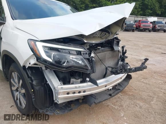 ✅ 2021 Honda Pilot EX-L • VIN: 5FNYF6H56MB025156 • Лот: 42706595. Опубликован ранее на IAAI с пробегом 92 419 миль. Бесплатный доступ к архиву аукционных продаж из США и подробный отчёт об истории автомобиля на DreamBid. Изображение 18.