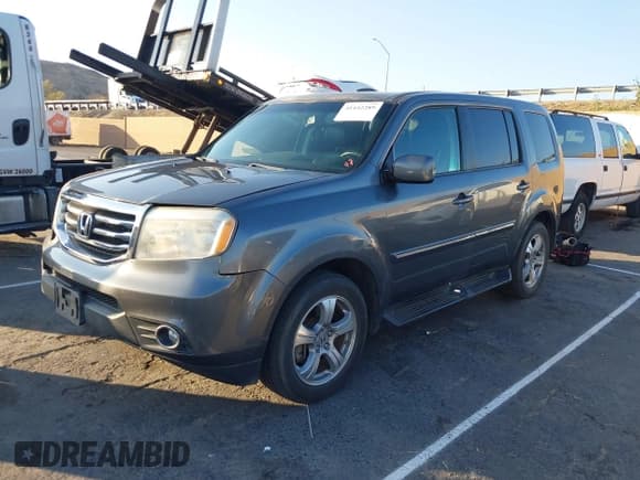 ✅ 2013 Honda Pilot EX-L • VIN: 5FNYF3H77DB038563 • Lot: 41442289. Listed on IAAI with 136,250 mi. Free auction sales archive from the USA and detailed vehicle history report at DreamBid. Image 2.