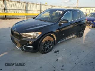 ✅ 2017 BMW X1 xDrive28i • VIN: WBXHT3C3XH5F72778 • Lot: 87363615. Listed on Copart with 134,300 mi. Free auction sales archive from the USA and detailed vehicle history report at DreamBid. Image 1.
