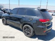 ✅ 2017 Jeep Grand Cherokee SRT • VIN: 1C4RJFDJ6HC654828 • Lot: 42677373. Listed on IAAI with 97,971 mi. Free auction sales archive from the USA and detailed vehicle history report at DreamBid. Image 3.