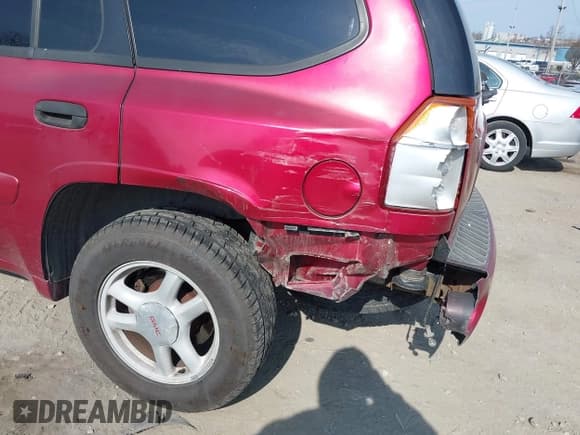 ✅ 2004 GMC Envoy SLE • VIN: 1GKDT13S442157704 • Lot: 41907592. Listed on IAAI with 127,000 mi. Free auction sales archive from the USA and detailed vehicle history report at DreamBid. Image 6.