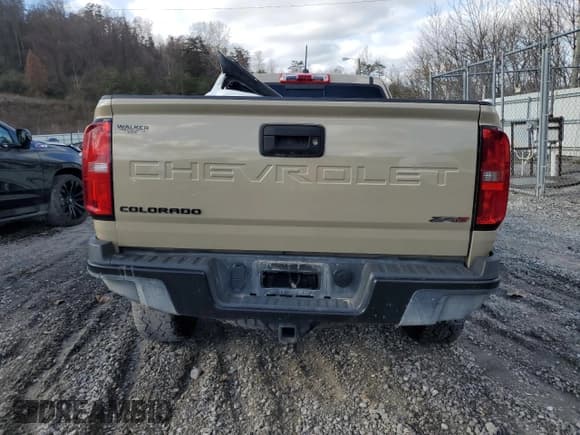 ✅ 2021 Chevrolet Colorado 4WD ZR2 • VIN: 1GCRTEEN2M1187631 • Лот: 82909564. Опубликован ранее на Copart с пробегом 52 950 миль. Бесплатный доступ к архиву аукционных продаж из США и подробный отчёт об истории автомобиля на DreamBid. Изображение 6.