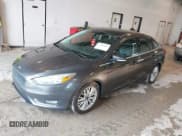 ✅ 2015 Ford Focus Titanium • VIN: 1FADP3J22FL260718 • Lot: 42545411. Listed on IAAI with 83,518 mi. Free auction sales archive from the USA and detailed vehicle history report at DreamBid. Image 2.