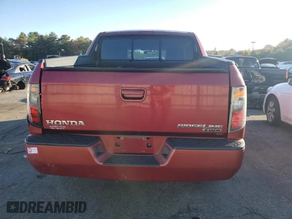 ✅ 2006 Honda Ridgeline RTS • VIN: 2HJYK16486H539270 • Lot: 85950645. Listed on Copart with 267,443 mi. Free auction sales archive from the USA and detailed vehicle history report at DreamBid. Image 6.