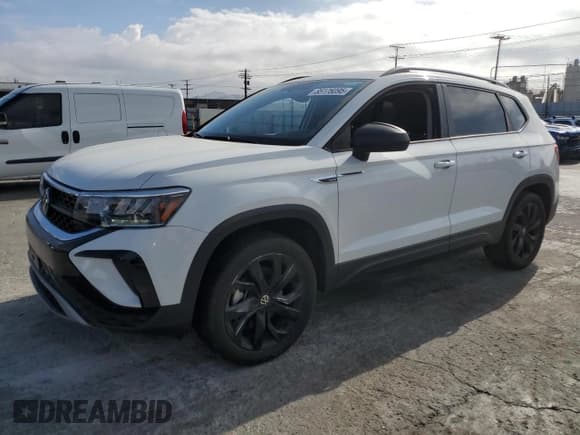 ✅ 2023 Volkswagen Taos S • VIN: 3VVAX7B21PM318659 • Lot: 85176095. Listed on Copart with 56,321 mi. Free auction sales archive from the USA and detailed vehicle history report at DreamBid. Image 1.