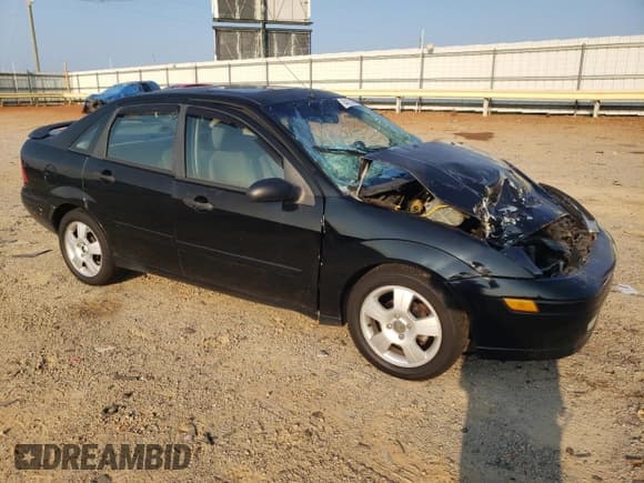 ✅ 2004 Ford Focus ZTS • VIN: 1FAFP38Z24W165048 • Лот: 64213195. Опубликован ранее на Copart с пробегом 320 448 миль. Бесплатный доступ к архиву аукционных продаж из США и подробный отчёт об истории автомобиля на DreamBid. Изображение 4.