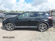 ✅ 2016 Toyota RAV4 XLE • VIN: 2T3RFREV2GW499811 • Lot: 43278390. Listed on IAAI with 148,028 mi. Free auction sales archive from the USA and detailed vehicle history report at DreamBid. Image 14.