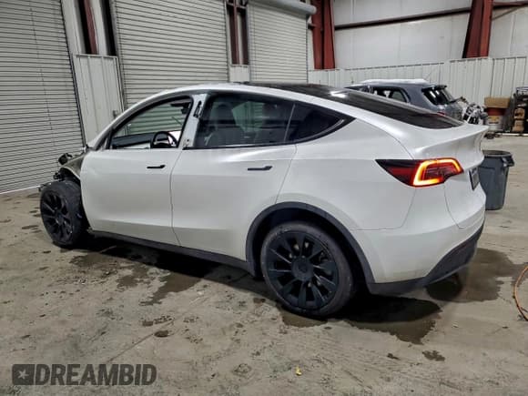 ✅ 2023 Tesla Model Y Long Range • VIN: 7SAYGDEE2PA176991 • Лот: 95689365. Опубликован ранее на Copart с пробегом 40 868 миль. Бесплатный доступ к архиву аукционных продаж из США и подробный отчёт об истории автомобиля на DreamBid. Изображение 2.