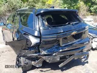 2025 Chevrolet Traverse AWD High Country z VIN 1GNEVKRS6SJ178359, wystawiony jako IAAI lot #43088601 z przebiegiem 14 026 mil mil oraz . Historia ofert i sprzedaży dostępna na DreamBid. Obrazek 3.