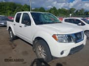 ✅ 2019 Nissan Frontier SV • VIN: 1N6AD0EV5KN742149 • Lot: 43051033. Listed on IAAI with 36,410 mi. Free auction sales archive from the USA and detailed vehicle history report at DreamBid. Image 1.
