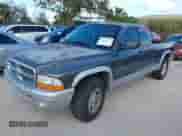 2002 Dodge Dakota SLT with VIN 1B7GL42N12S666975, listed as a IAAI auction lot 40743979 with 137,926 mi miles and . Bid and sale history available at DreamBid. Image 2.