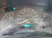 2002 Chevrolet Silverado 1500 LS with VIN 1GCEK14T42Z347338, listed as a Copart auction lot 87610705 with 298,775 mi miles and Salvage title. Bid and sale history available at DreamBid. Image 9.