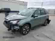 2018 Subaru Forester Limited with VIN JF2SJARC8JH586461, listed as a Copart auction lot 86336885 with 65,237 mi miles and Salvage title. Bid and sale history available at DreamBid. Image 1.