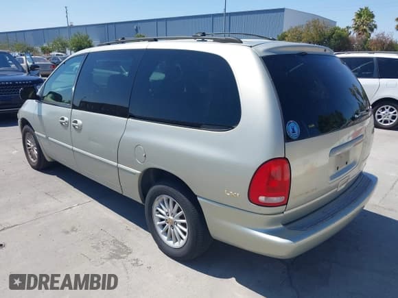 ✅ 1999 Chrysler Town & Country LX • VIN: 1C4GP54L1XB864596 • Lot: 42753995. Listed on IAAI with Not provided. Free auction sales archive from the USA and detailed vehicle history report at DreamBid. Image 3.